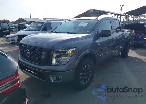 2019 Nissan Titan Pro-4X из США, поврежденный, VIN 1N6AA1E58KN520526